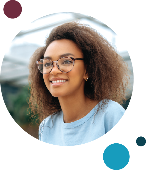 smiling black woman with glasses