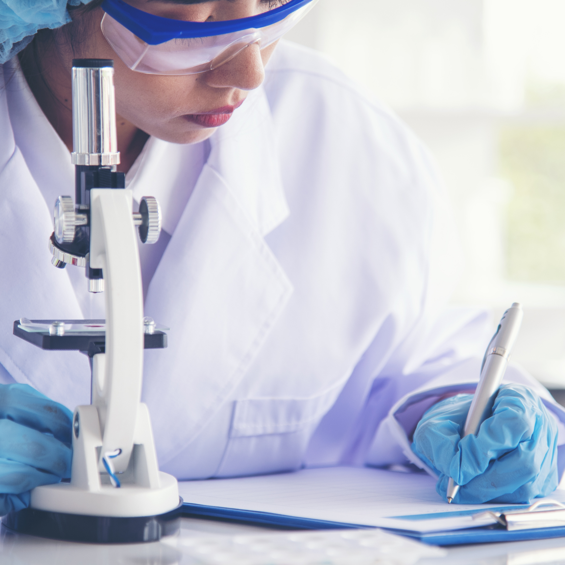 Woman Scientist with Microscope